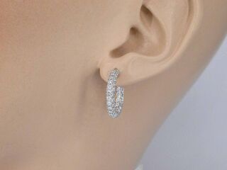 Witgouden oorbellen met briljant geslepen diamanten