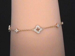 Rosegouden armband in klaver vier vorm met diamanten