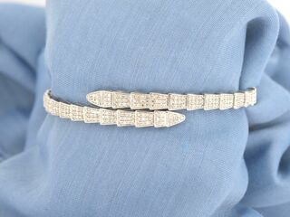 Witgouden armband van serpent model met natuurlijke diamanten
