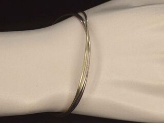 Armband met drie kleuren goud