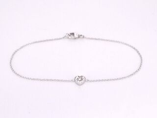 Witgouden armband met diamanten hartje 0.10 carat
