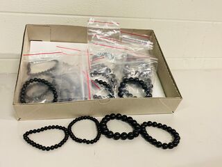 Ca. 20x Shungiet kogelarmbanden