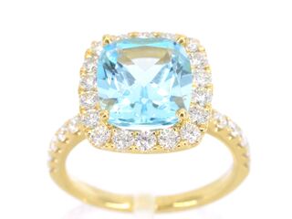 Gouden entourage ring met natuurlijke topaas en diamanten
