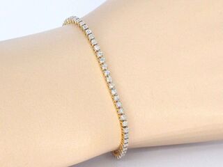 Gouden tennis armband met natuurlijke diamanten