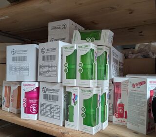Ca. 60x Anti-colic babyfles, Twisthake, groen / roze