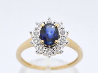 Gouden entourage ring met saffier en briljanten