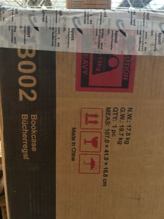 2x Boekenkast en vloerkleed