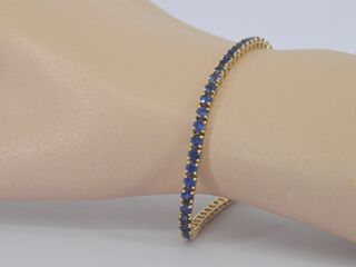 Gouden tennisarmband met natuurlijke saffieren