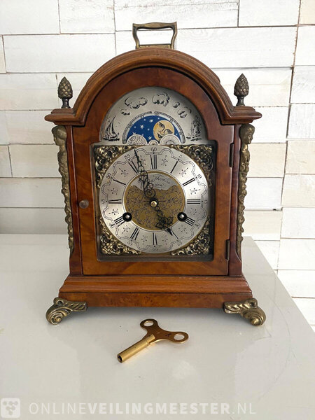 Table clock in wooden case with moon phase, address on the dial