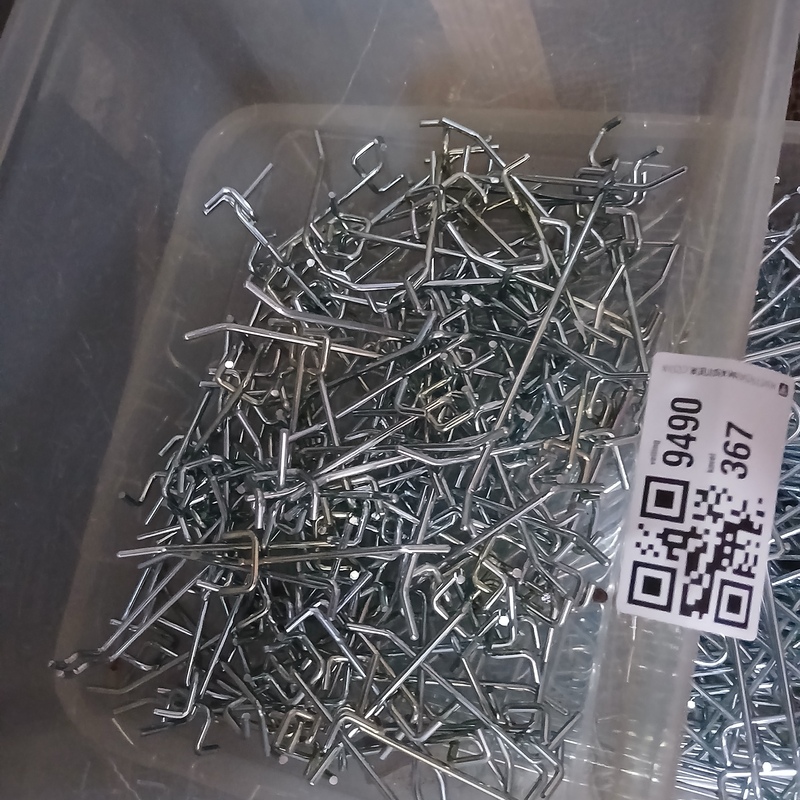 Metalen ophanghaken van metalen gatenwandrek