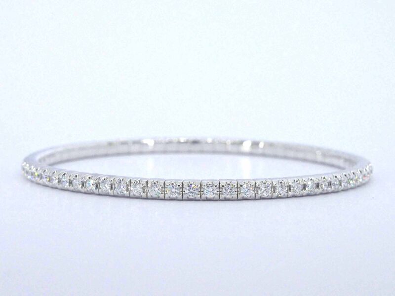 Witgouden armband met briljant geslepen diamanten en een onzichtbare sluiting