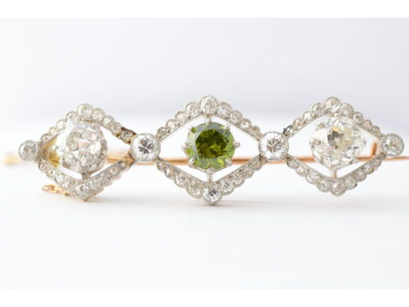 Antieke broche met old cut diamanten en zeldzame demantoid
