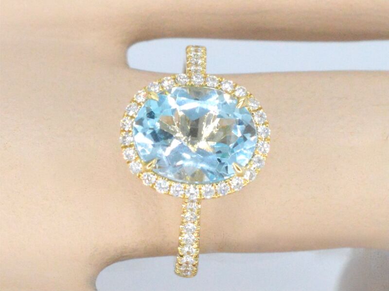 Gouden entourage ring met ovaal geslepen topaas – foto 2 – kavel bij Onlineveilingmeester