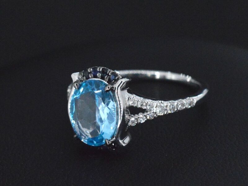 Witgouden ring met diamanten en mooie edelstenen