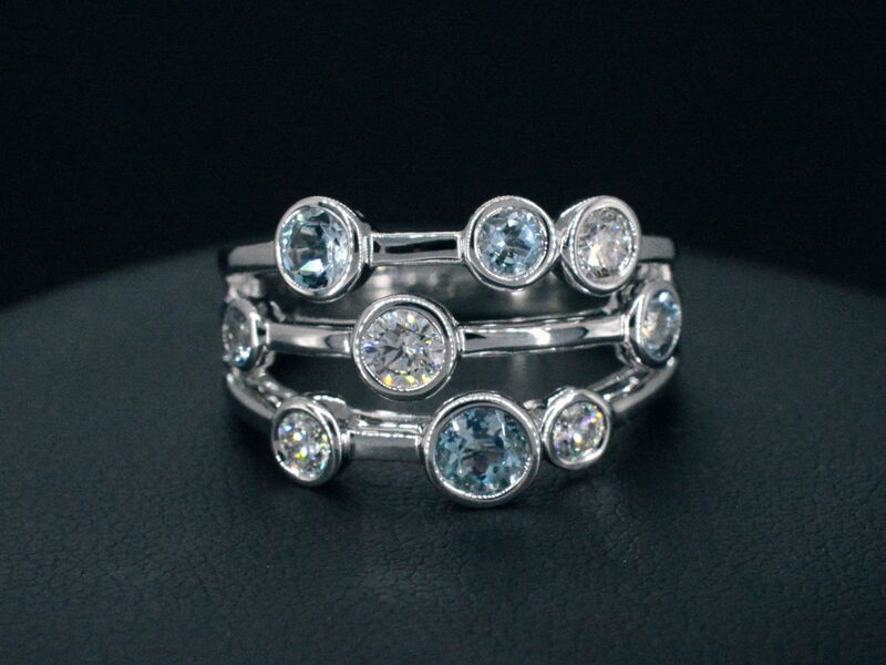 Witgouden design ring met aquamarijn en diamant