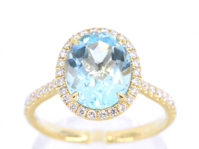 Gouden entourage ring met ovaal geslepen topaas – kavel bij Onlineveilingmeester