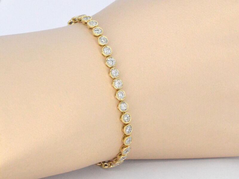 Gouden armband vol met diamanten gezet – foto 2 – kavel bij Onlineveilingmeester