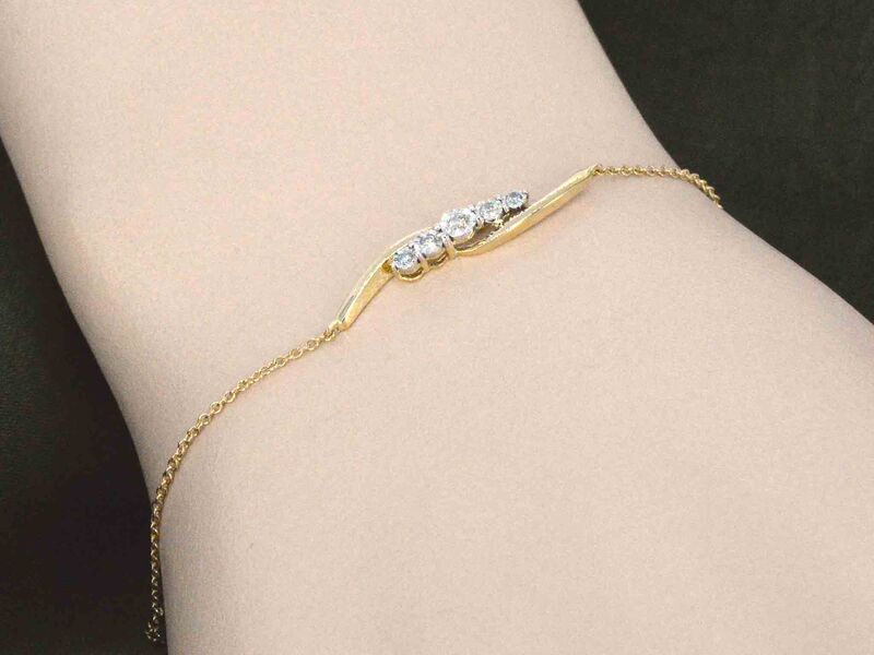 Gouden armband met diamanten in een rij gezet – foto 6 – kavel bij Onlineveilingmeester